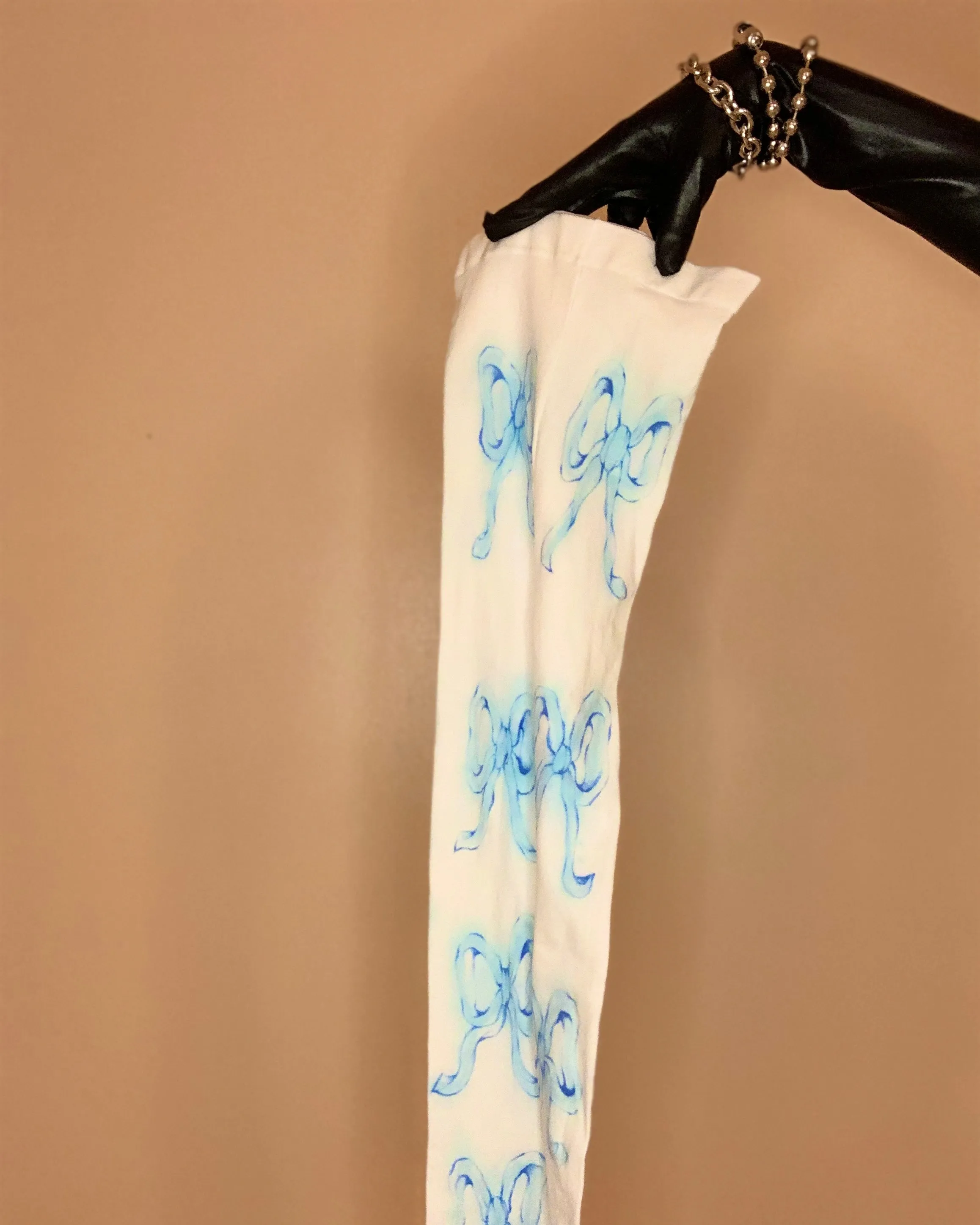 Recycled ghost bow drip tights